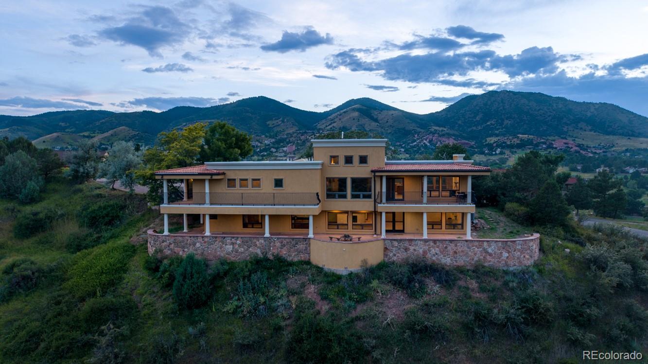 5970 Crestbrook Drive Morrison, CO 80465 - Photo 34 of 34 an aerial view of a house with a big yard
