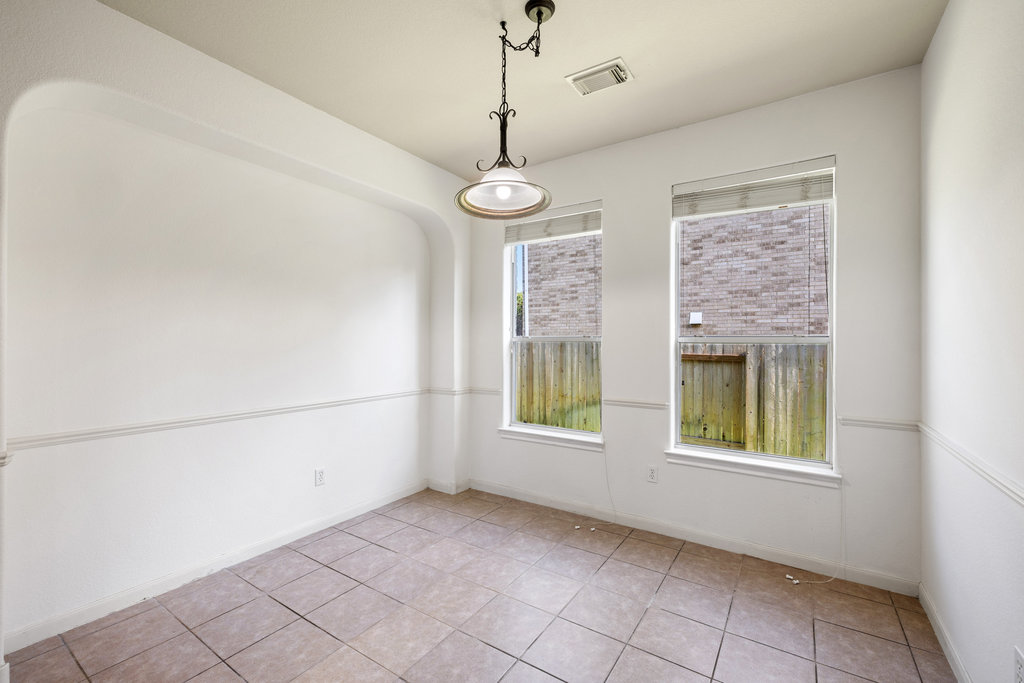 2617 Salorn Way Round Rock, TX 78681 - Photo 11 of 40 a view of an empty room with windows