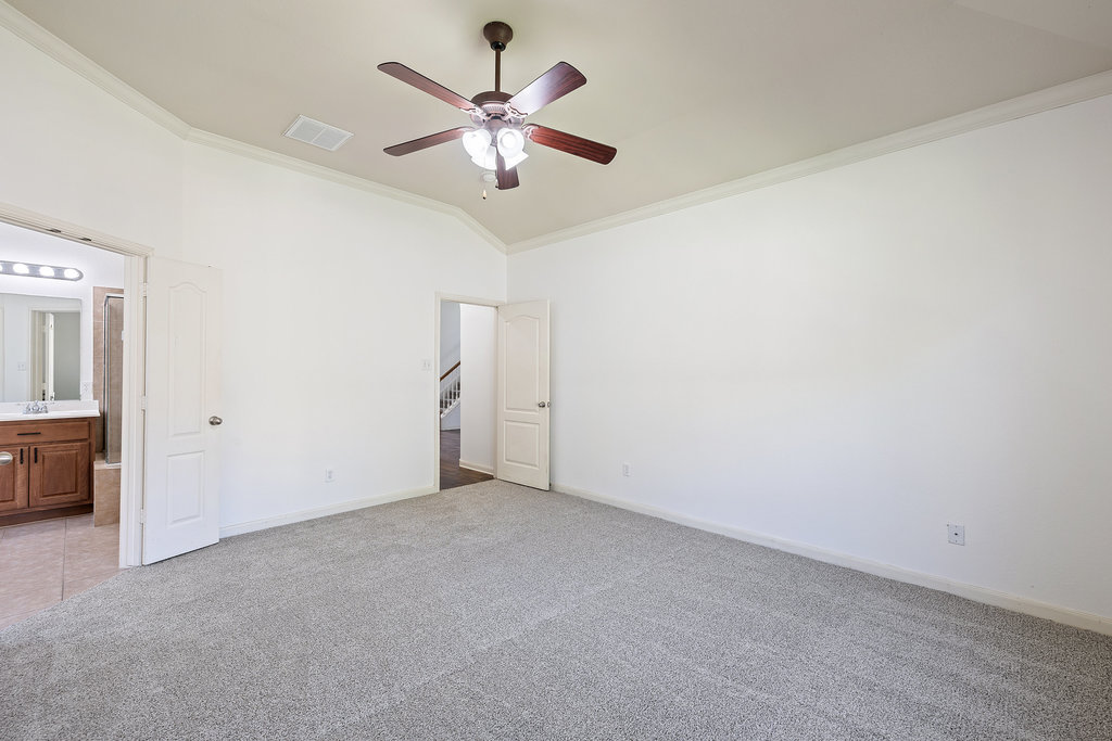 2617 Salorn Way Round Rock, TX 78681 - Photo 18 of 40 an empty room with chandelier fan
