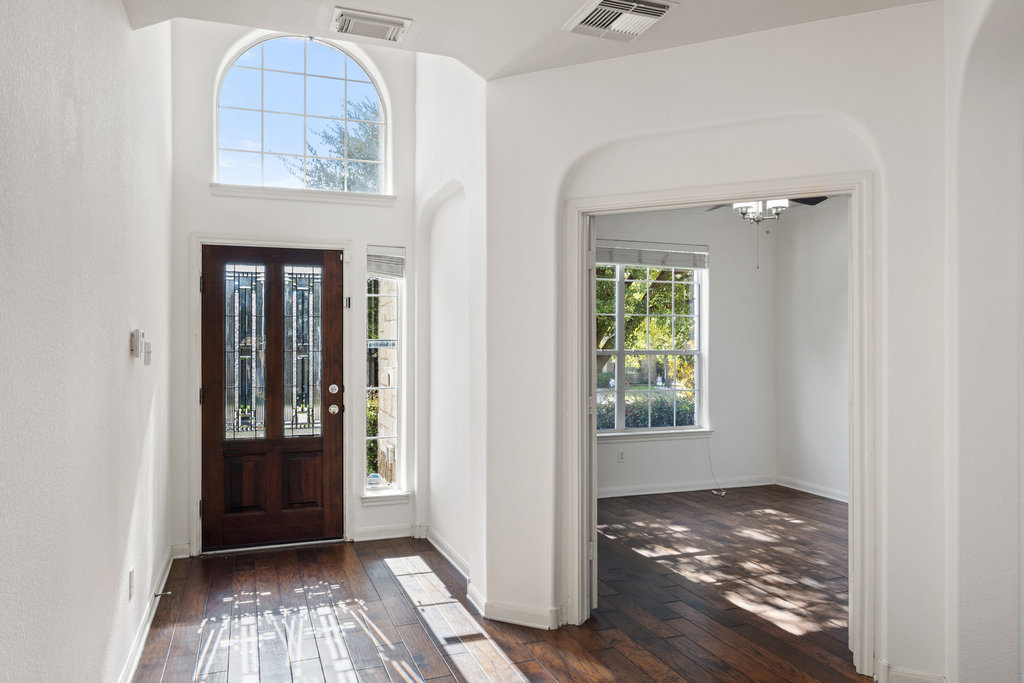 2617 Salorn Way Round Rock, TX 78681 - Photo 3 of 40 a view of an entryway with wooden floor