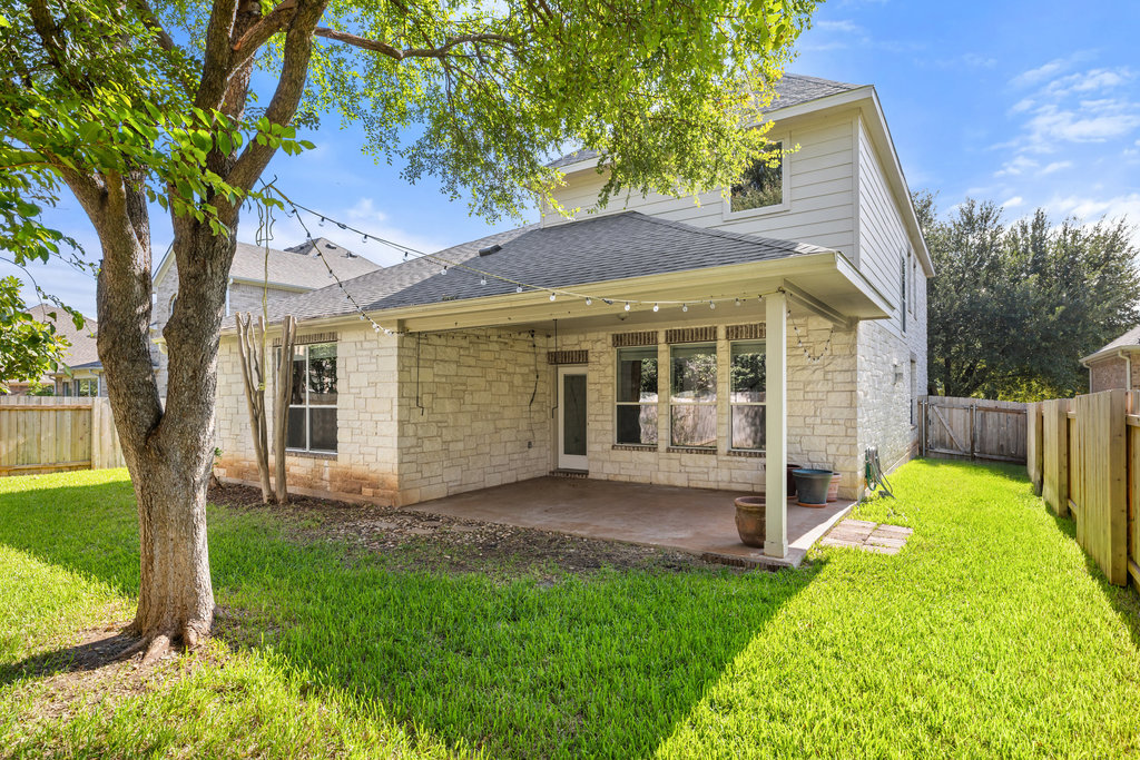 2617 Salorn Way Round Rock, TX 78681 - Photo 40 of 40 a view of a house with a yard and a large tree