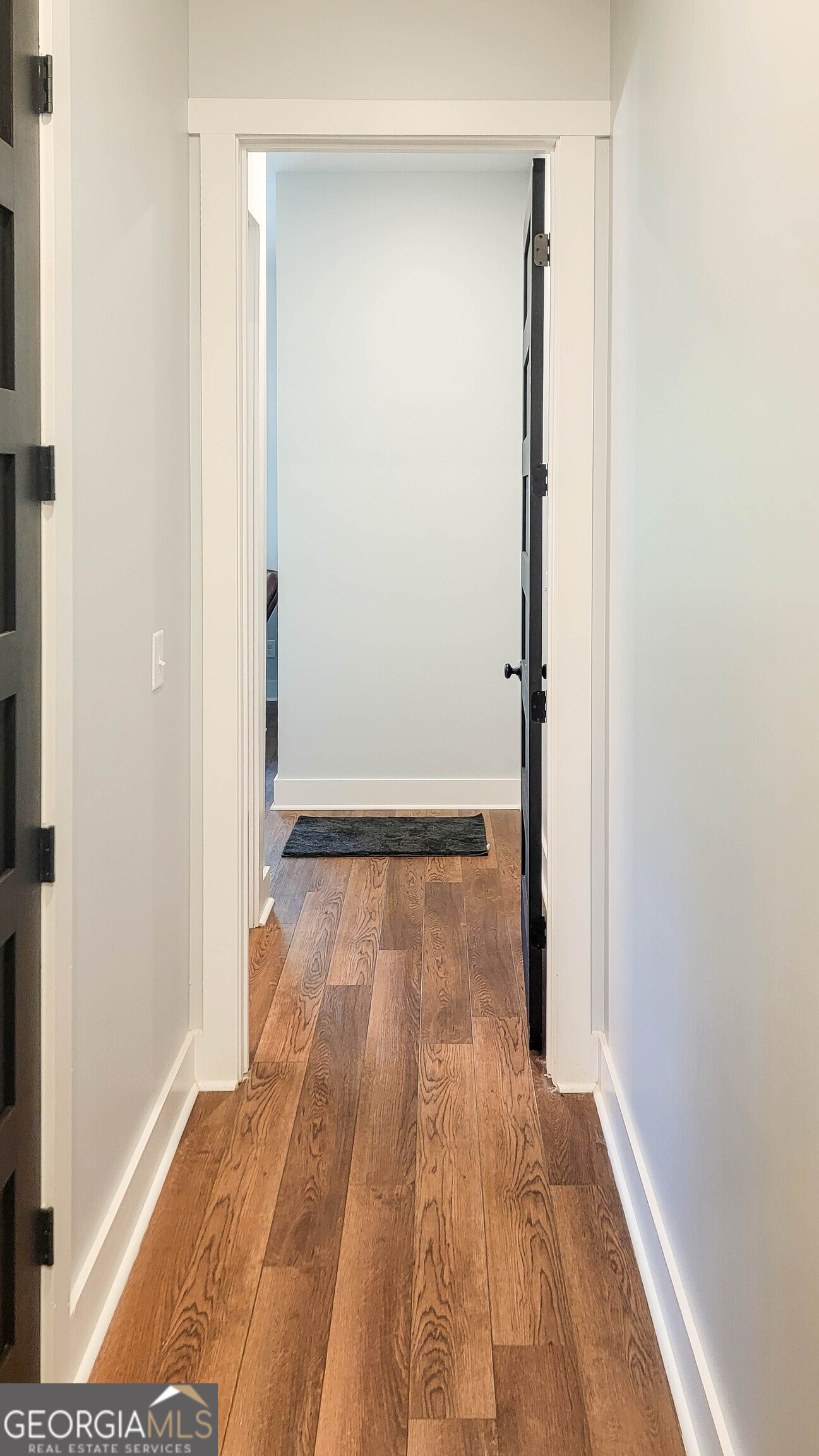 209 Lee Road Salem, AL 36874 - Photo 32 of 37 a view of a room with wooden floor and a bathroom