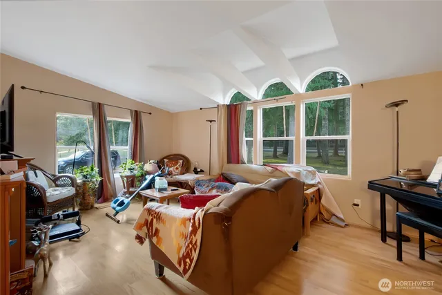 a bed room with a bed and a window