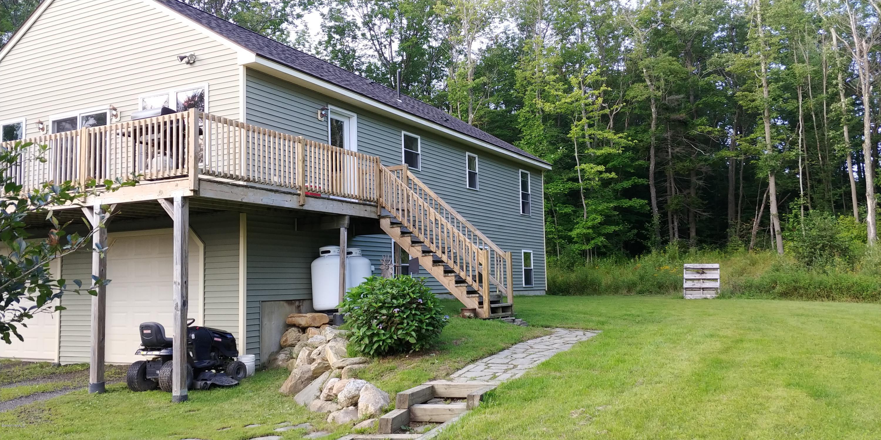 229 East Windsor Road Peru, MA 01235 - Photo 1 of 9 a view of a house with backyard