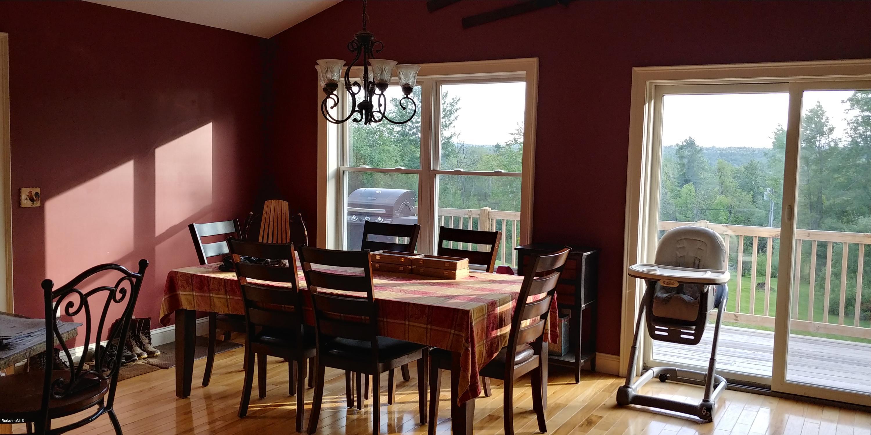 229 East Windsor Road Peru, MA 01235 - Photo 4 of 9 a view of a dining room with furniture window and outside view