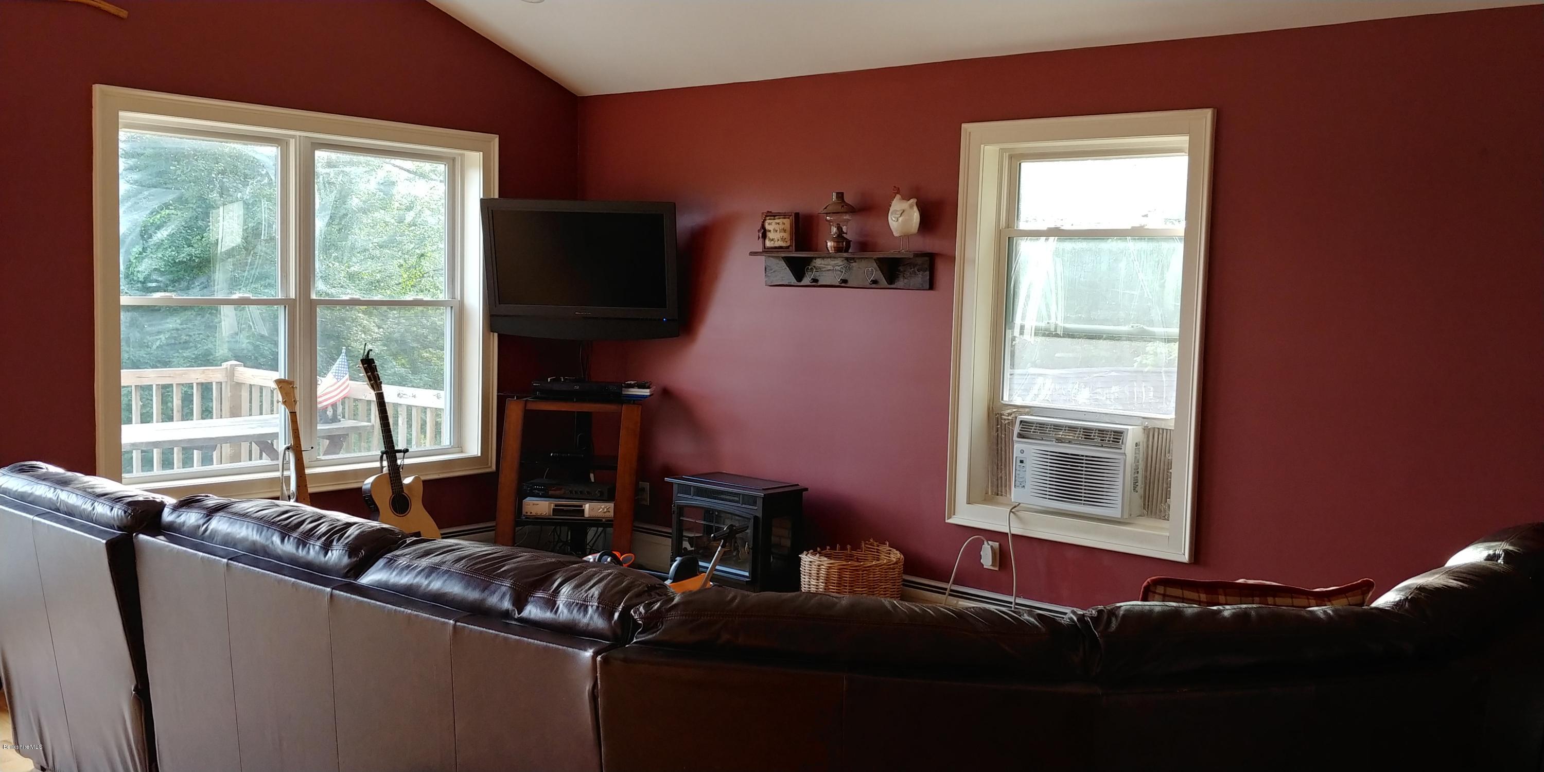 229 East Windsor Road Peru, MA 01235 - Photo 5 of 9 a living room with furniture and a window