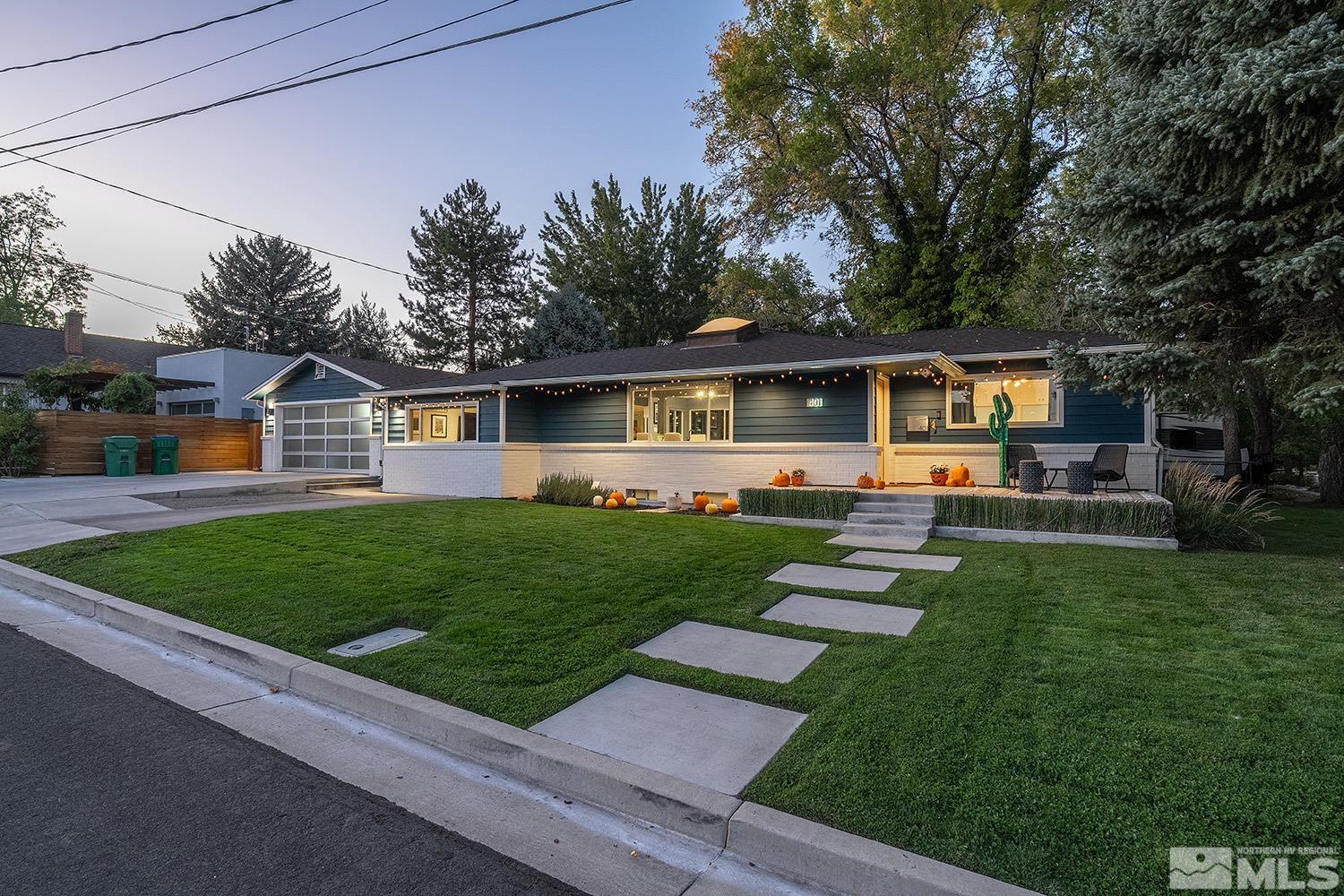 401 Brown Street Reno, NV 89509 - Photo 1 of 40 a front view of house with yard and green space