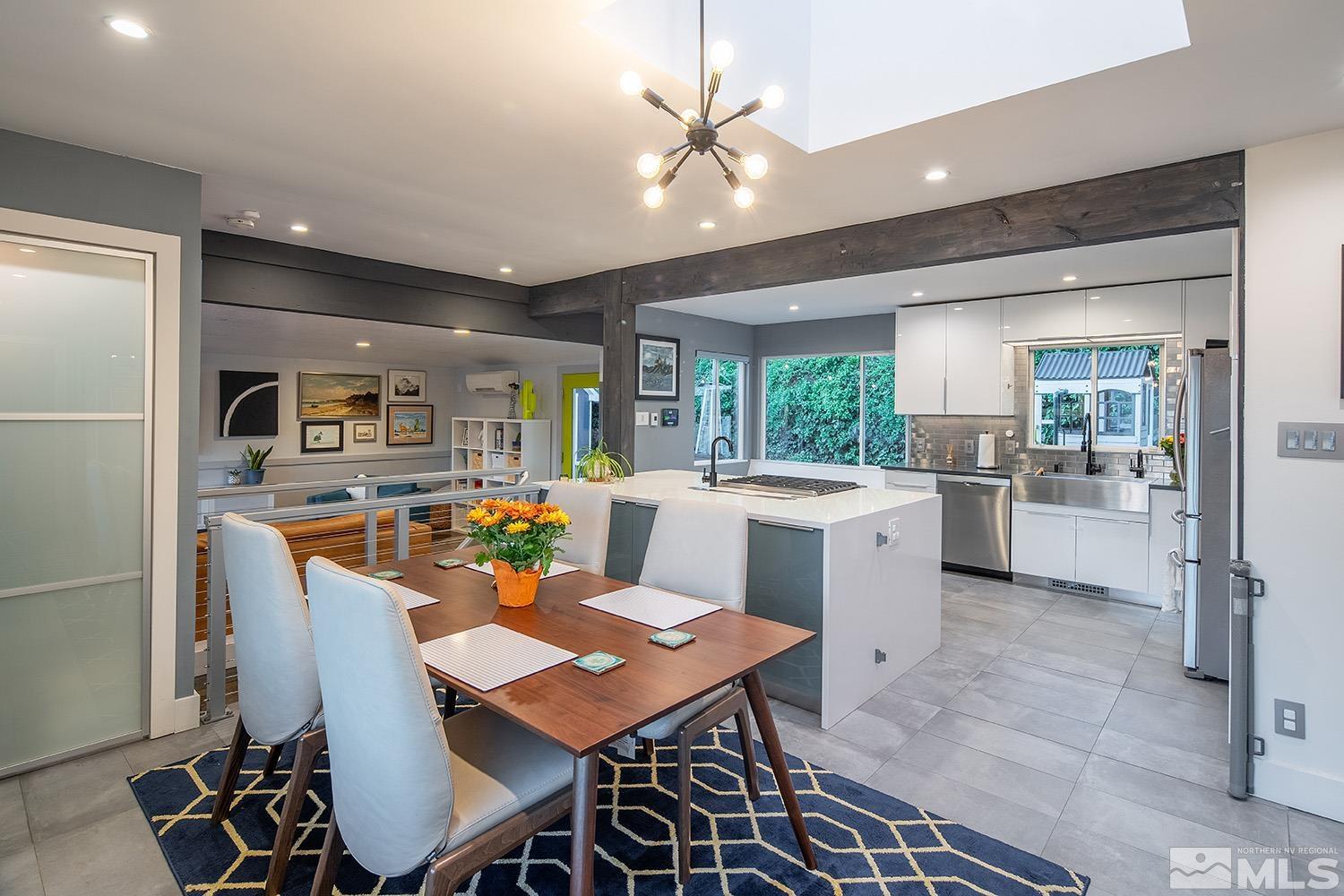 401 Brown Street Reno, NV 89509 - Photo 14 of 40 a kitchen that has a table and chairs in it