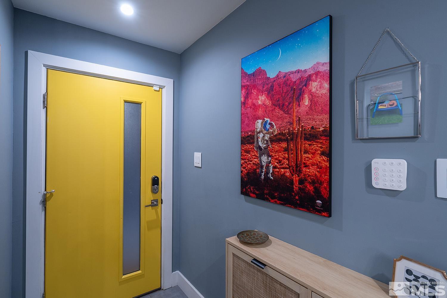 401 Brown Street Reno, NV 89509 - Photo 20 of 40 a bathroom with a painting on the wall and a shower