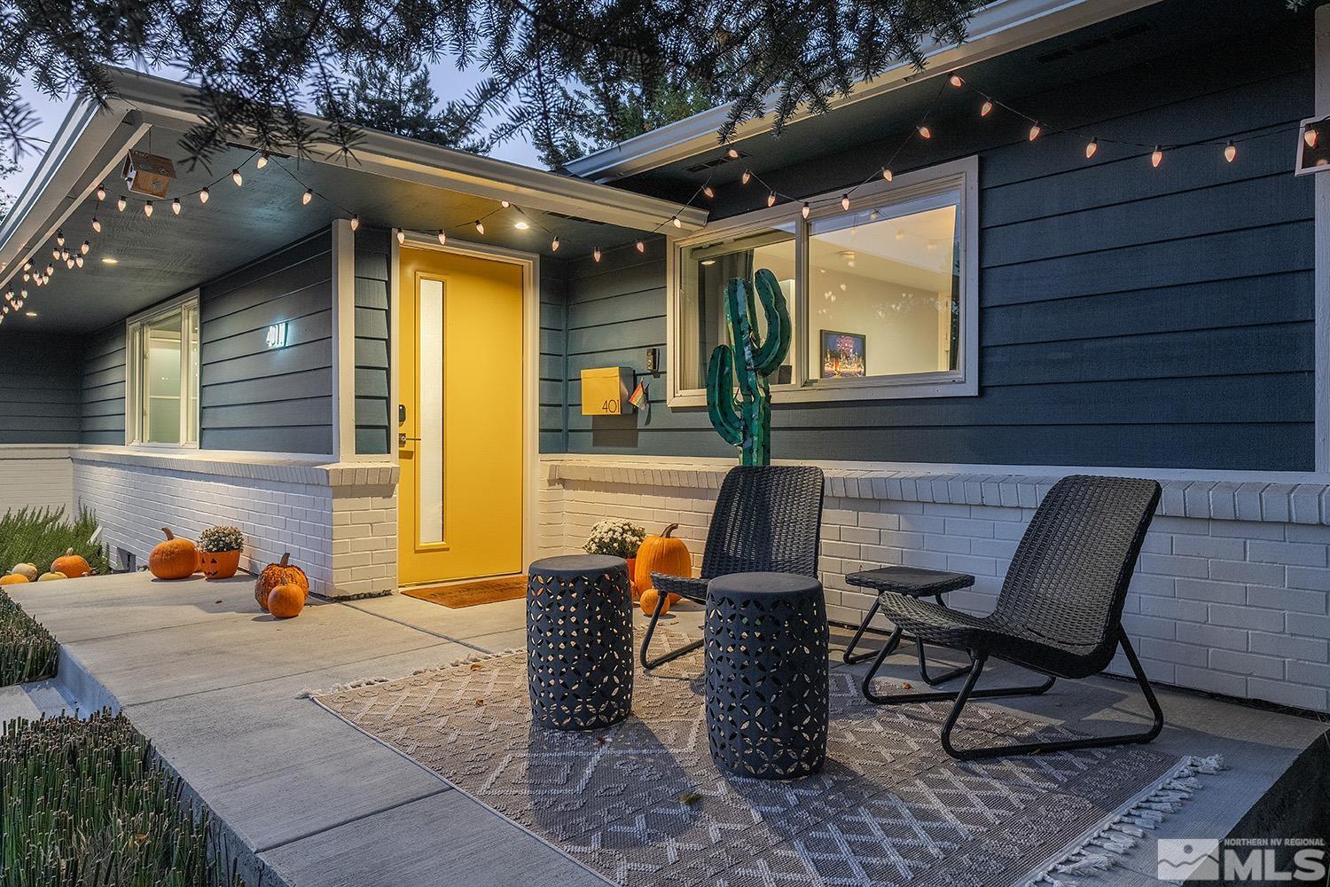 401 Brown Street Reno, NV 89509 - Photo 2 of 40 a backyard of a house with outdoor seating