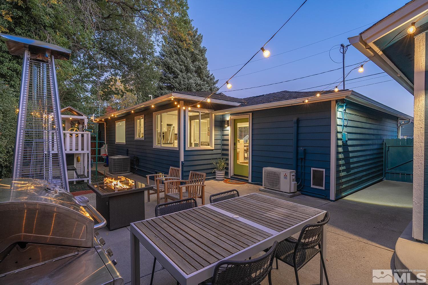 401 Brown Street Reno, NV 89509 - Photo 32 of 40 a view of a dinning table and chairs in patio