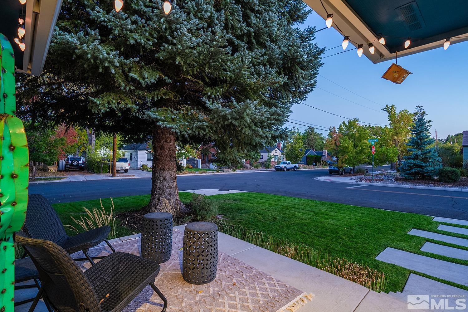 401 Brown Street Reno, NV 89509 - Photo 33 of 40 a view of yard with outdoor seating and trees