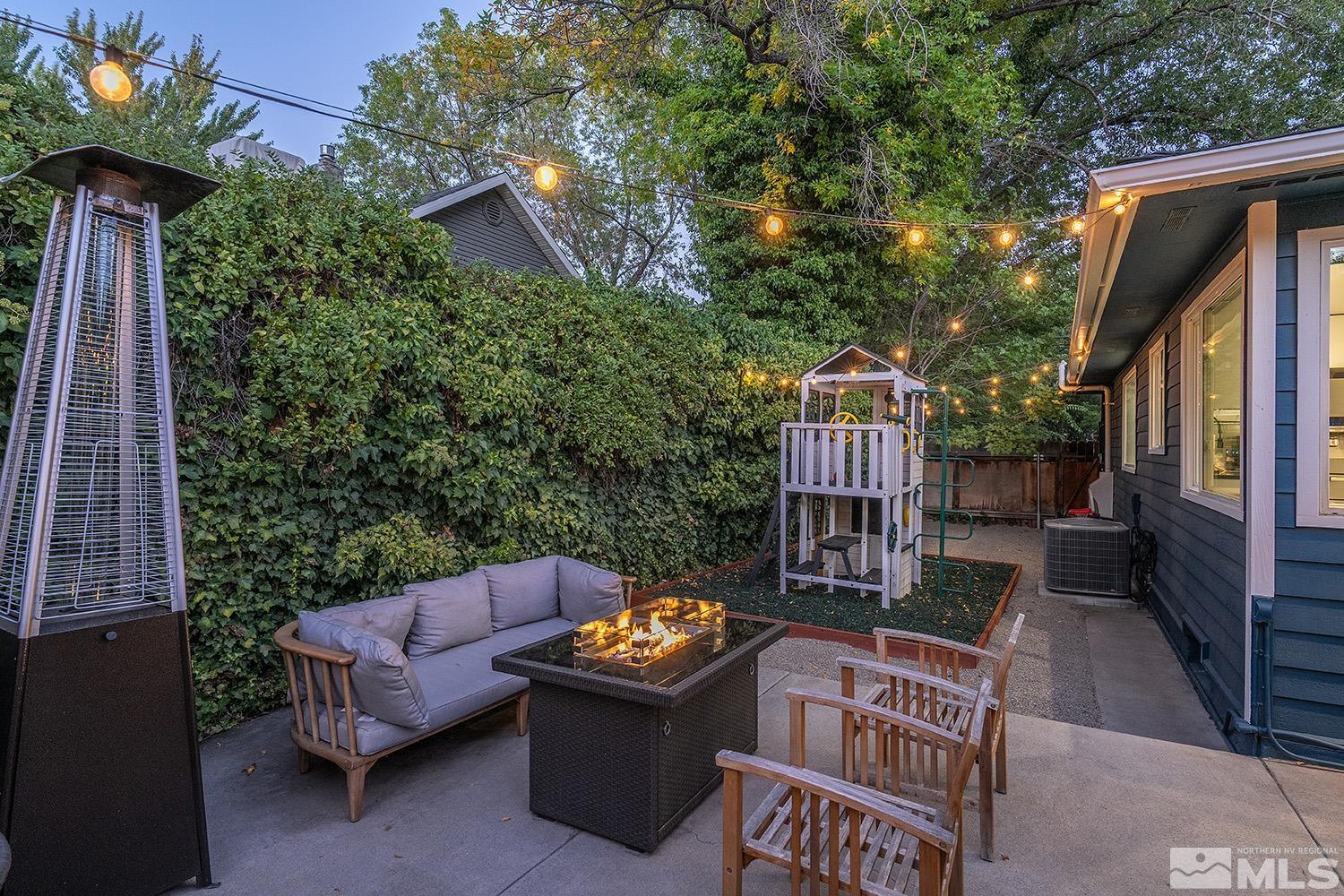 401 Brown Street Reno, NV 89509 - Photo 34 of 40 a view of a patio with couches table and chairs and potted plants