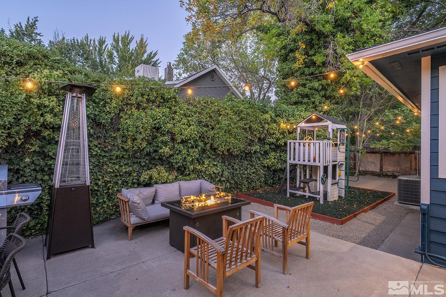 401 Brown Street Reno, NV 89509 - Photo 35 of 40 a backyard of a house with table and chairs