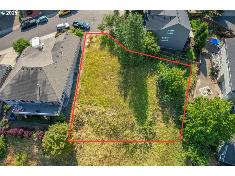 a aerial view of a house with a garden and plants