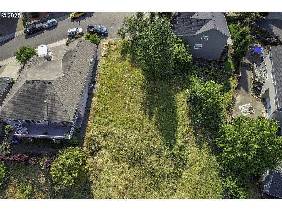 2765 Prominent Court South Salem, OR 97302 - Photo 15 of 16 a aerial view of a house with a garden and plants