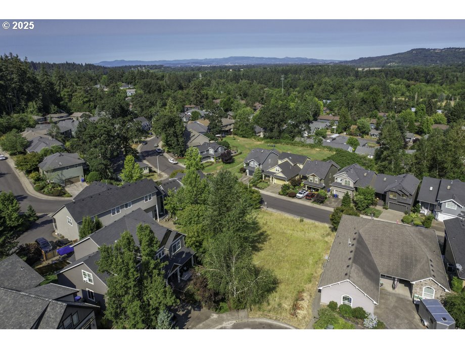 2765 Prominent Court South Salem, OR 97302 - Photo 9 of 16 a view of a house with a lake view