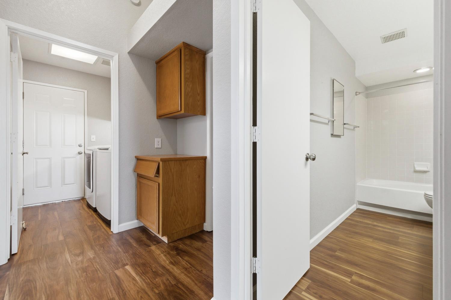 969 Colson Way Galt, CA 95632 - Photo 26 of 38 a view of a hallway with wooden floor and closet