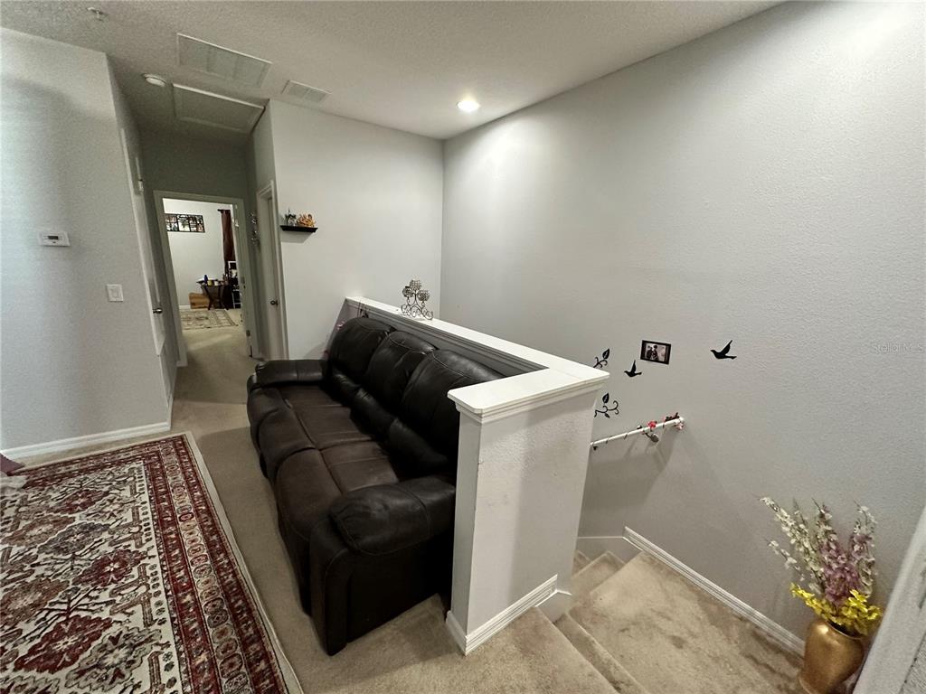 250 Rustic Loop Sanford, FL 32771 - Photo 26 of 33 a utility room with rug washer and dryer
