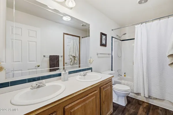 a kitchen with a sink and a refrigerator