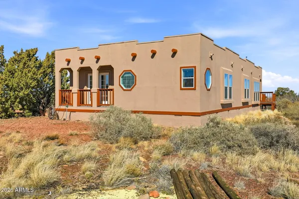 a kitchen with a stove and a wooden cabinets
