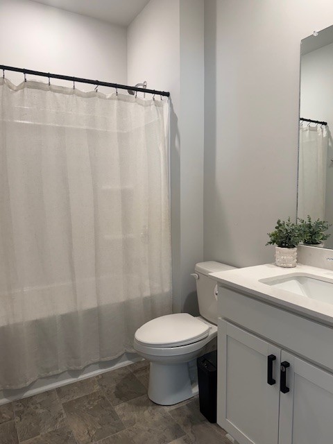 7301 Golden Way White House, TN 37188 - Photo 15 of 30 a bathroom with a sink a toilet and shower