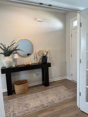 a room with a table and chairs
