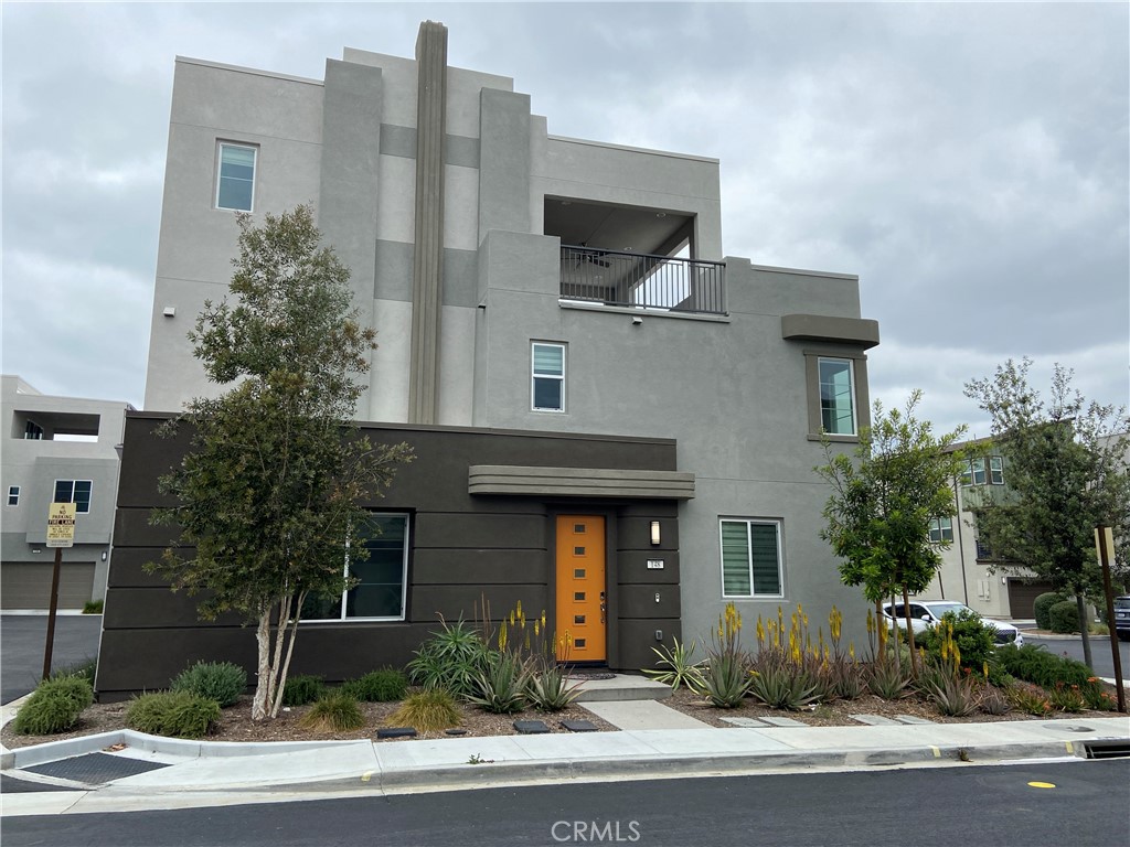 148 Tenor Irvine, CA 92618 - Photo 1 of 1 a front view of a building with a garden