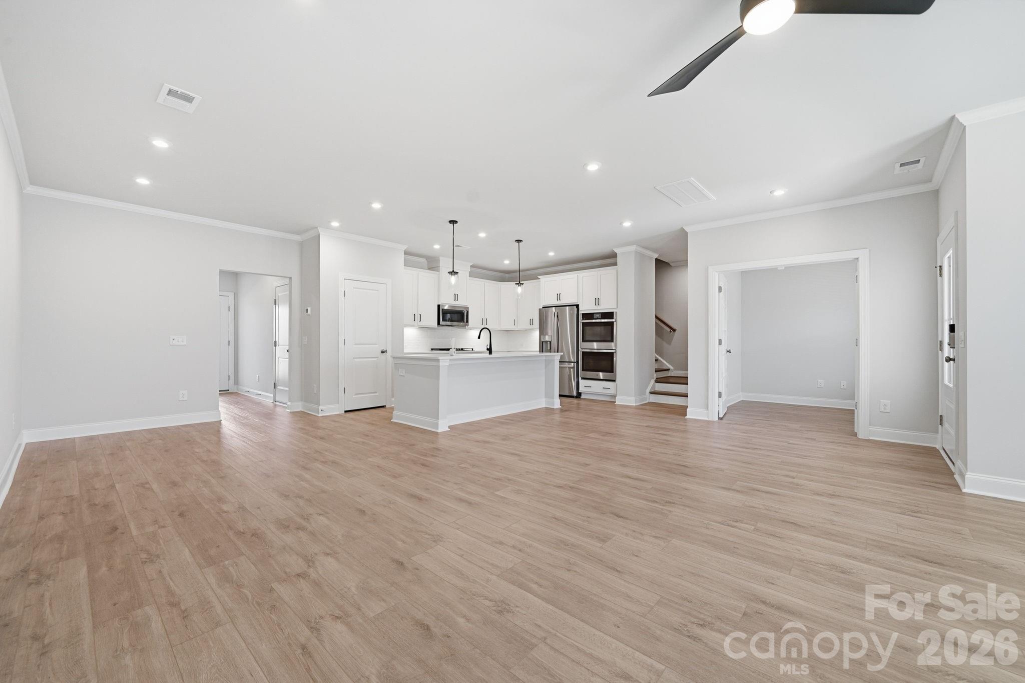 1823 Viewfield Road Fort Mill, SC 29708 - Photo 27 of 43 a view of a electric appliances in center and hall with wooden floor