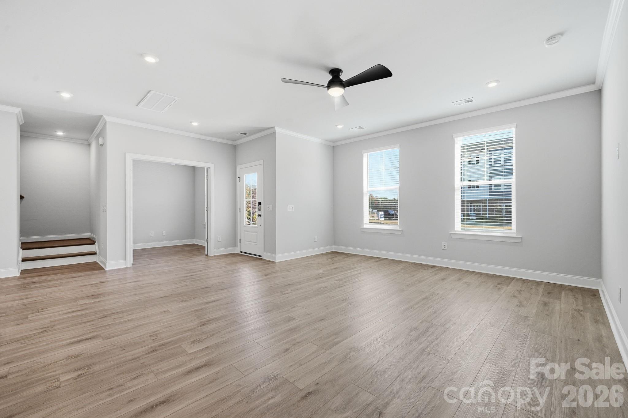 1823 Viewfield Road Fort Mill, SC 29708 - Photo 29 of 43 a view of an empty room with wooden floor and a window
