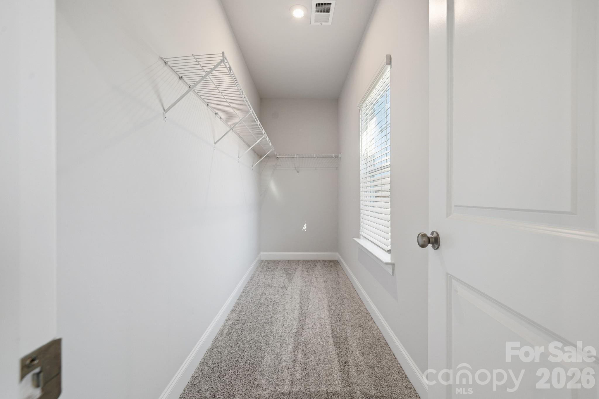 1823 Viewfield Road Fort Mill, SC 29708 - Photo 5 of 43 a view of a hallway with wooden floor and entryway