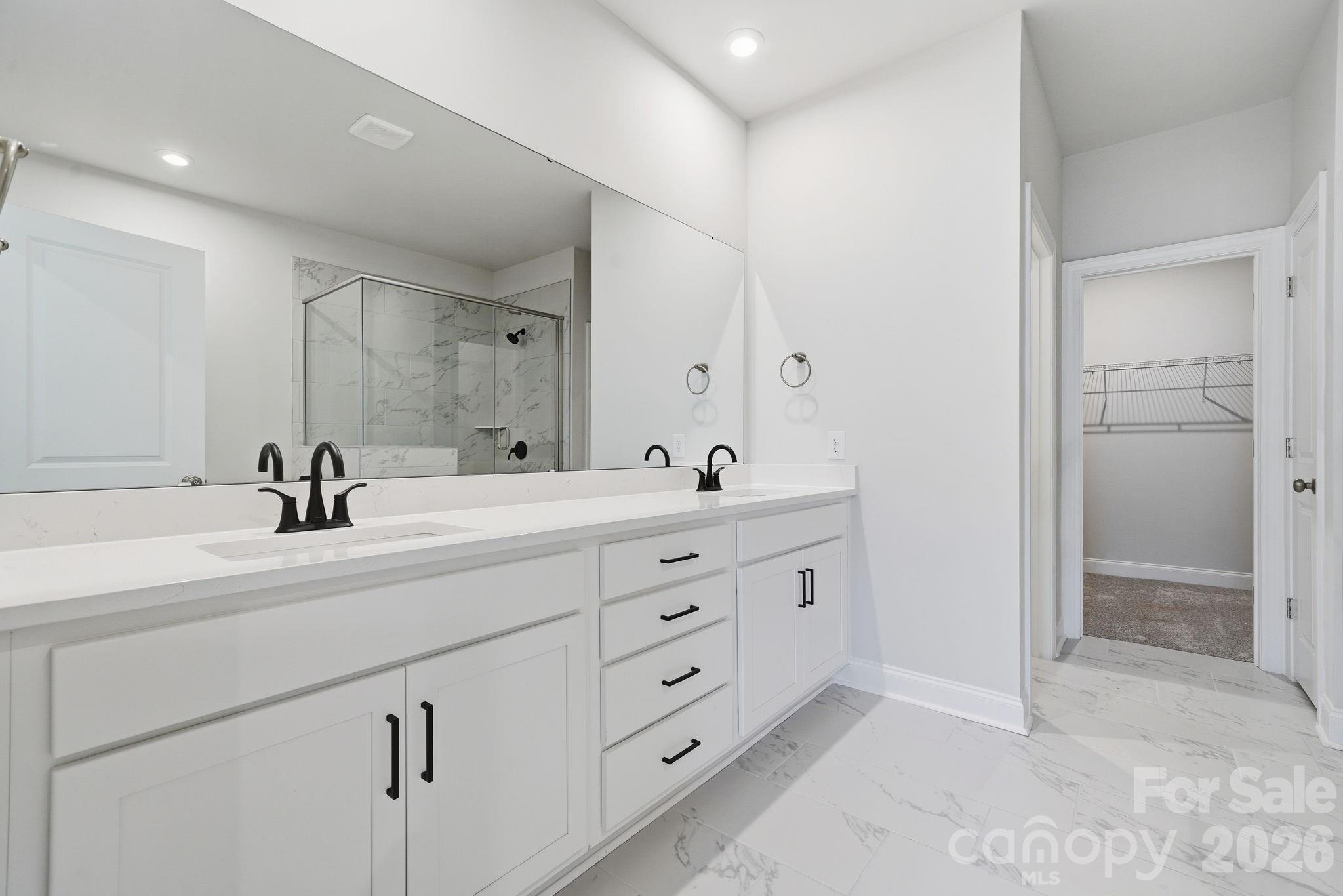 1823 Viewfield Road Fort Mill, SC 29708 - Photo 6 of 43 a spacious bathroom with double sink a and a mirror