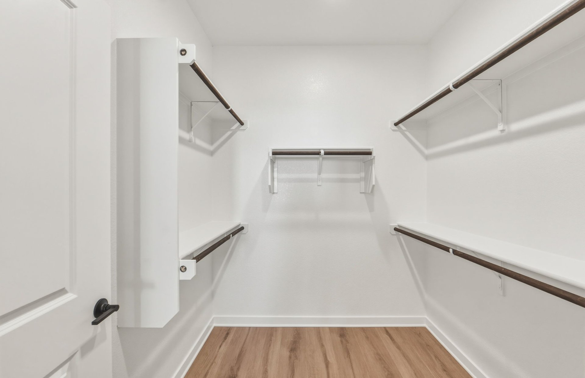207 Smokestack Lane Georgetown, TX 78633 - Photo 11 of 21 a view of staircase with wooden floor and white walls