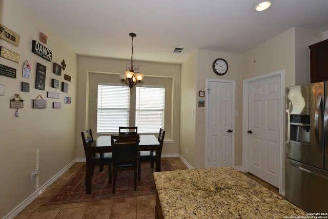 a view of a dining room with furniture