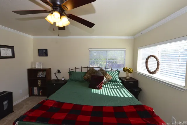 a work room with furniture and windows