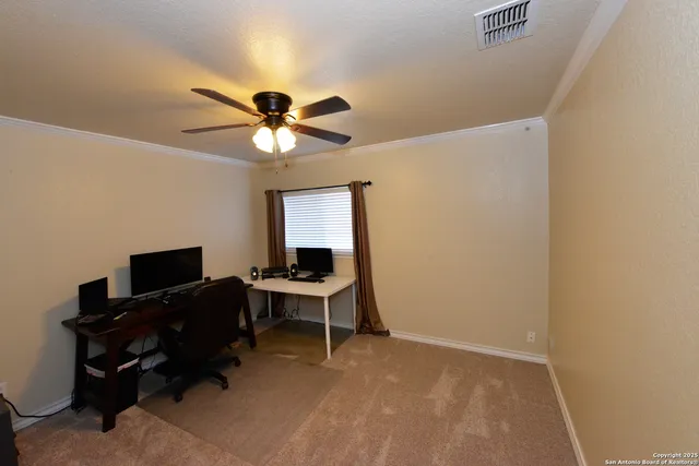 a view of a workspace with furniture