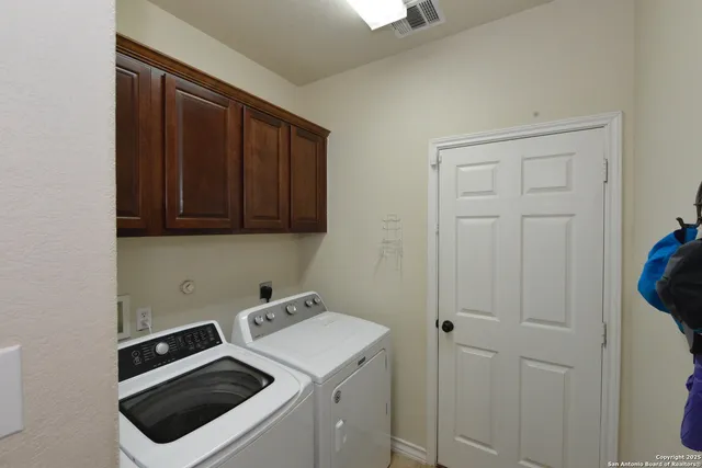 a view of a backyard of the house