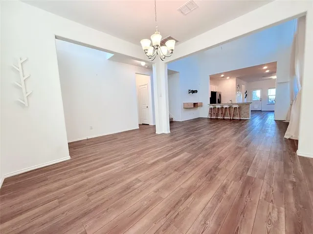 a view of a livingroom with wooden floor