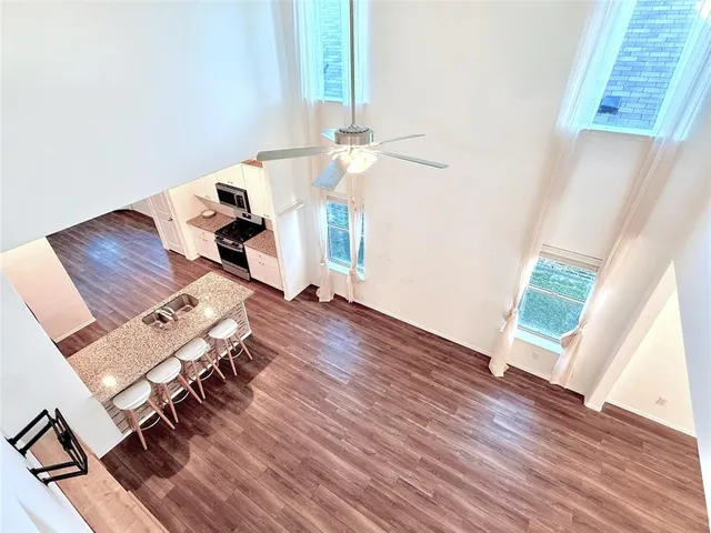 wooden floor with table and chairs in wooden floor