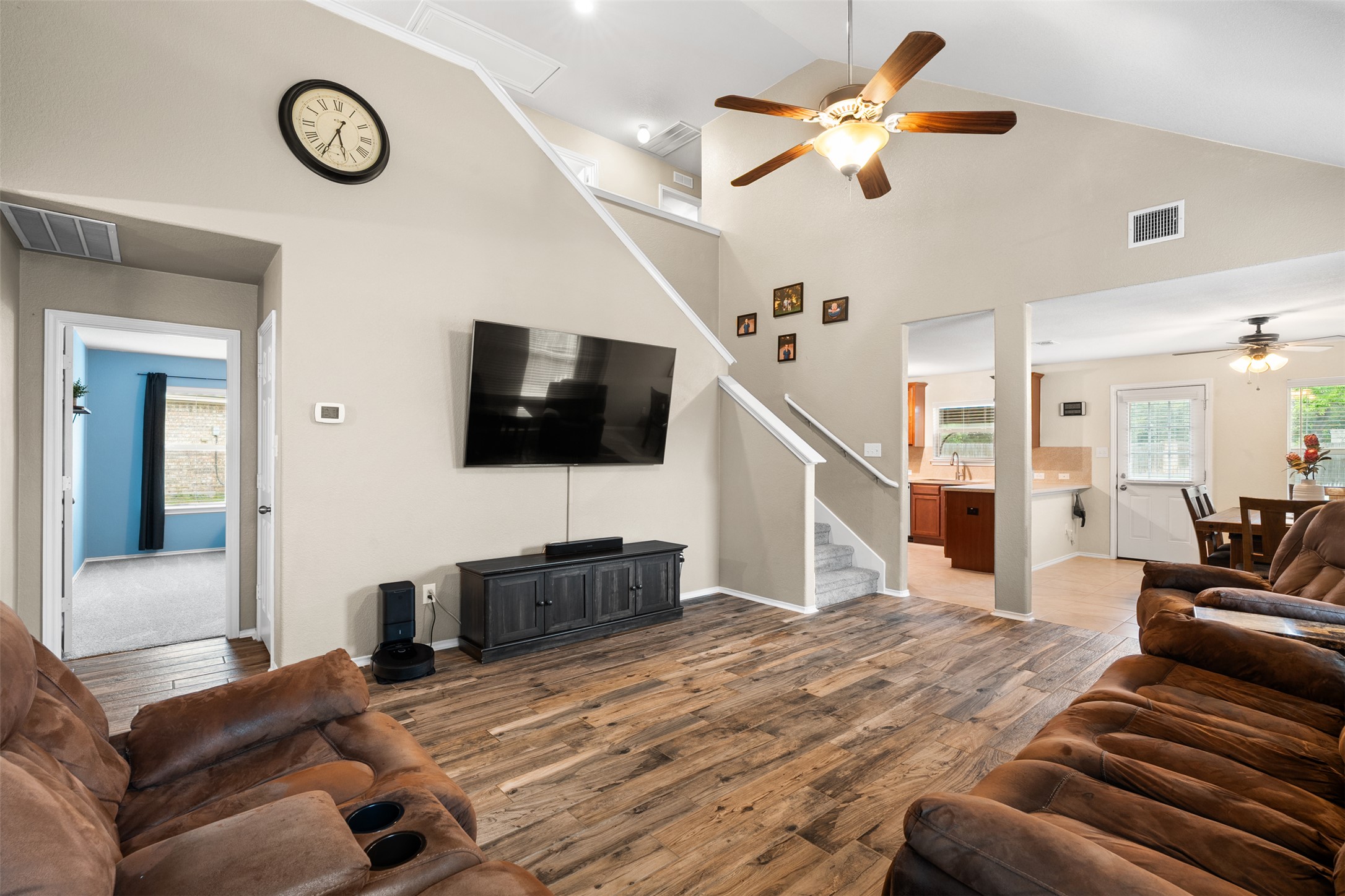 137 Barn Owl Loop Leander, TX 78641 - Photo 11 of 36 a living room with furniture and a flat screen tv