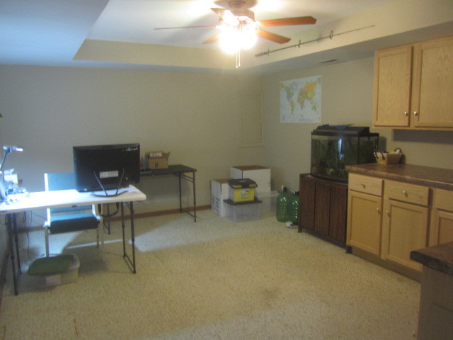 25696 Raska Lane Lake Villa, IL 60046 - Photo 19 of 27 a workspace with furniture and chandelier