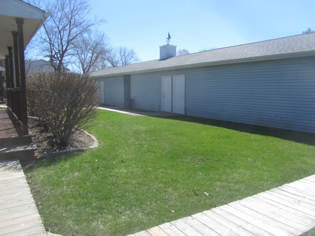 25696 Raska Lane Lake Villa, IL 60046 - Photo 25 of 27 a view of a backyard with a garden