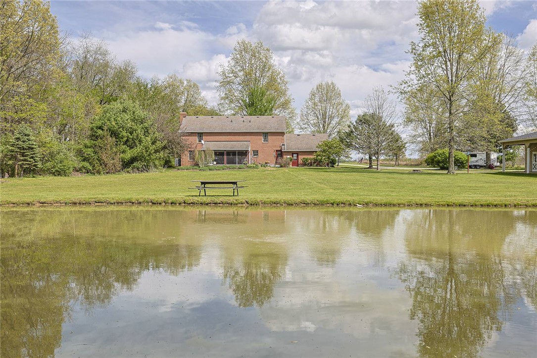 1757 Phillips Road Lebanon, OH 45036 - Photo 33 of 51 This tranquil estate offers verdant landscapes and a serene pond.