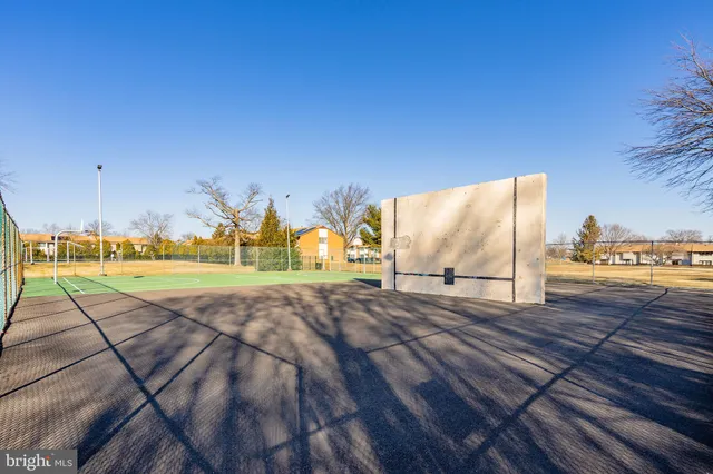 a view of a swimming pool with an ocean view