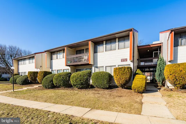 a front view of a house with patio