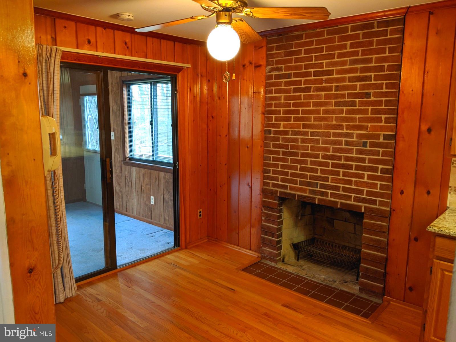 6711 Jerome Street Springfield, VA 22150 - Photo 12 of 24 Fireplace in dining area off of kitchen