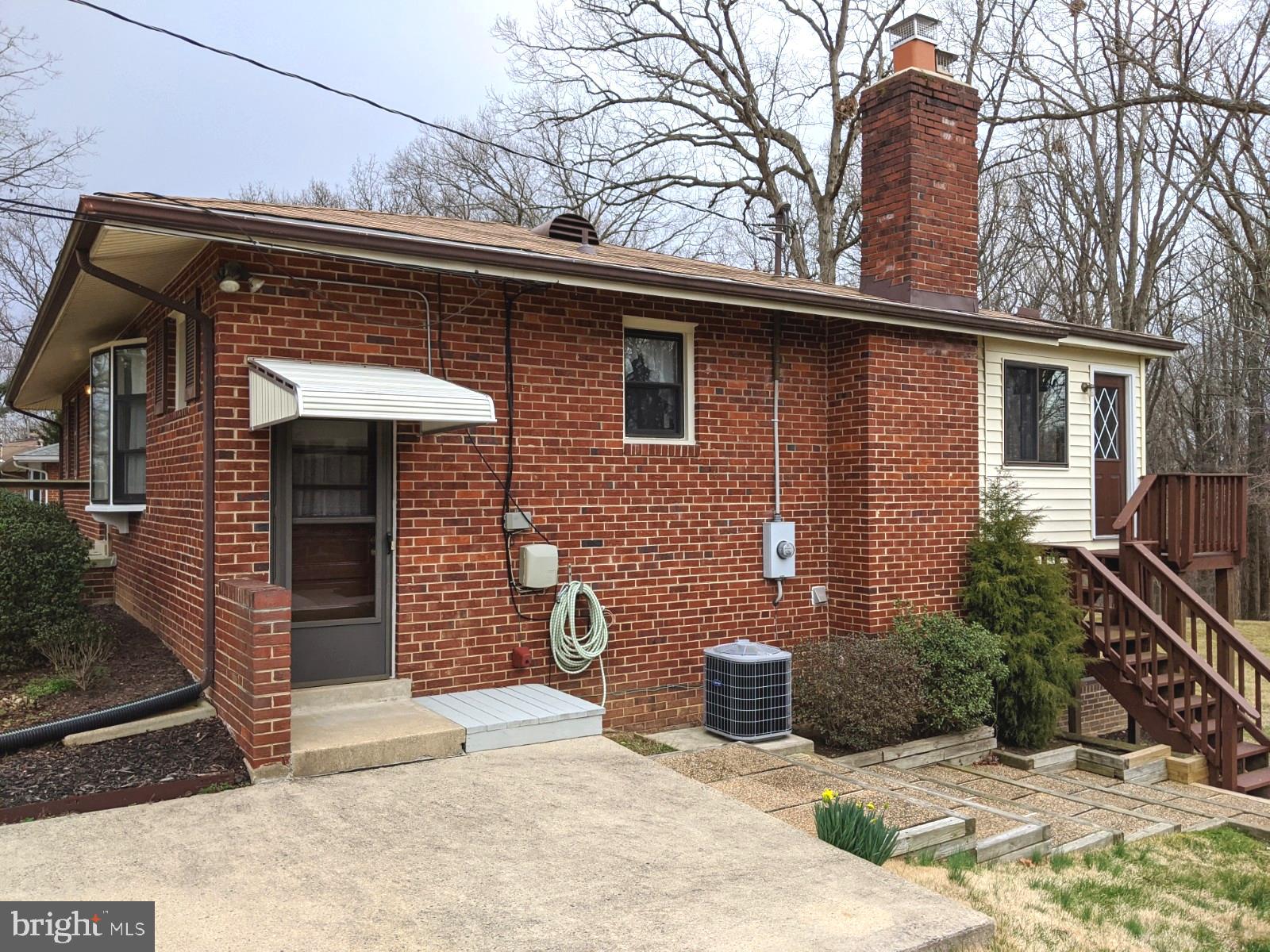 6711 Jerome Street Springfield, VA 22150 - Photo 4 of 24 Awning at side entrance