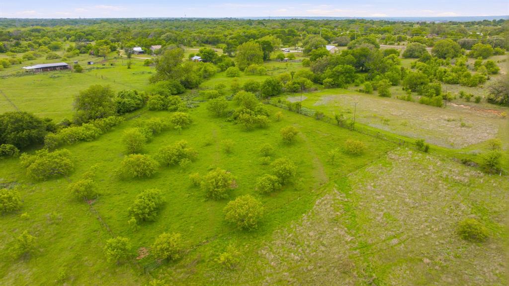 4823 Airport Road Aledo, TX 76008 - Photo 14 of 39 a view of a green field with an ocean view