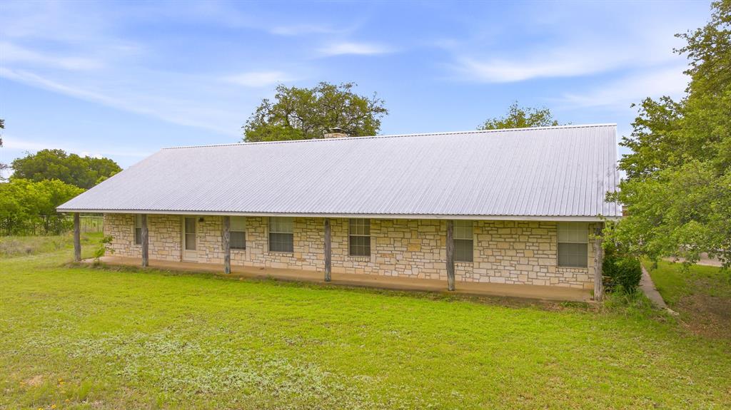 4823 Airport Road Aledo, TX 76008 - Photo 15 of 39 a view of a house with a yard