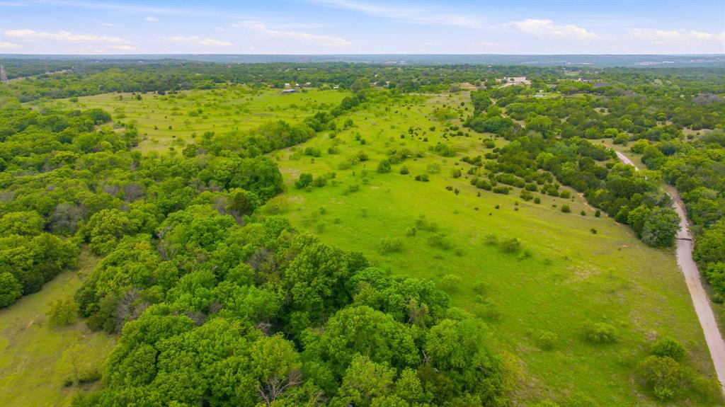 4823 Airport Road Aledo, TX 76008 - Photo 28 of 39 a view of a yard with a house